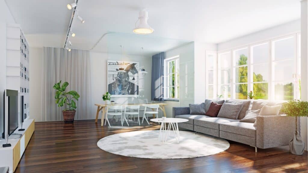 Thoroughly cleaned living room showcasing gleaming hardwood floors and well-maintained furniture.